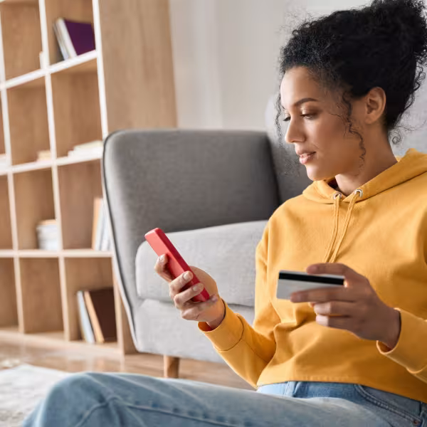 Woman making payment using digital banking features.