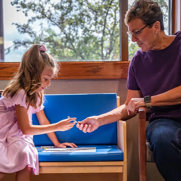 grandmother and granddaughter in lobby