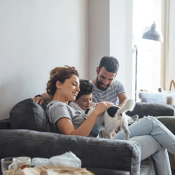 Family sitting on couch