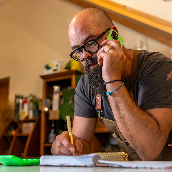 business owner making business call