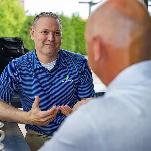 business banker talking with client