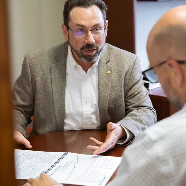 investment officer working with client