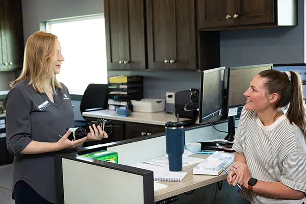 Banker and customer speaking