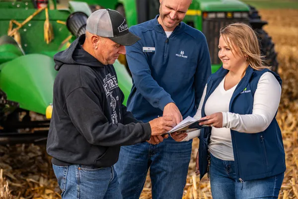 Farmer and bankers in conversation