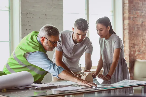Couple meeting with contractor