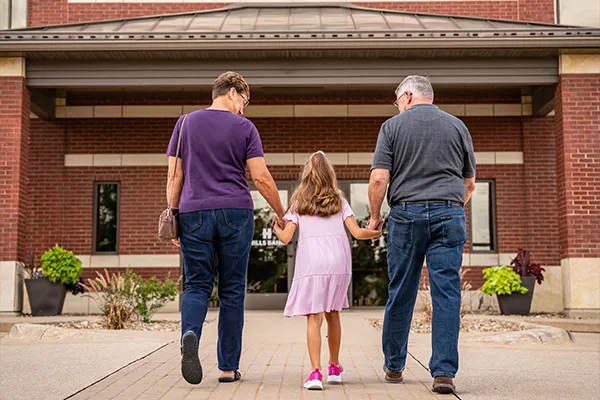 grandparents with grandchild