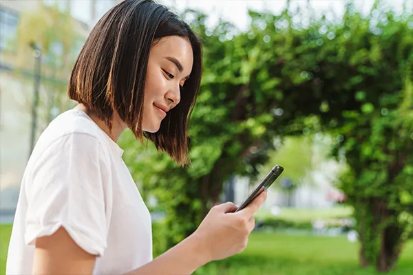 girl looking at phone