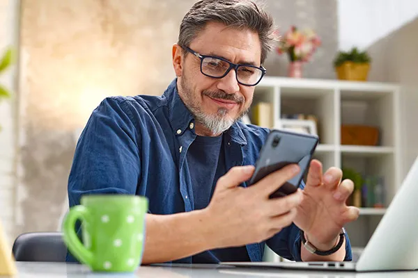 man looking at phone