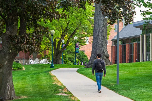 student walking on campus