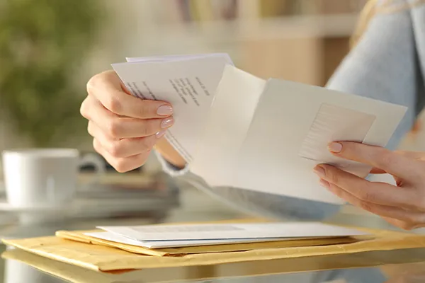 Person opening mail