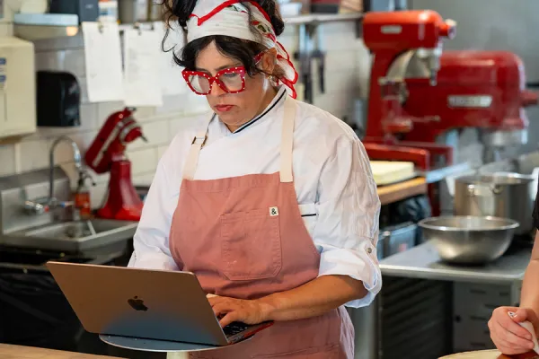 Business owner on laptop