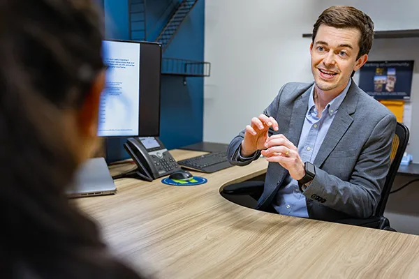 retirement officer meeting with a client